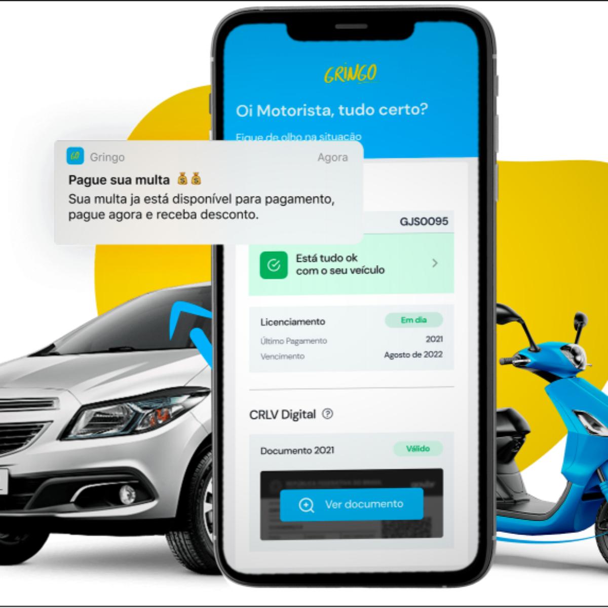 Celular com o Super App do Gringo exibindo um alerta de nova multa disponível para consulta e pagamento.